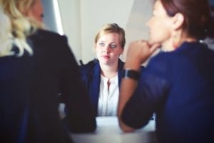 Manager resolving conflict between two employees