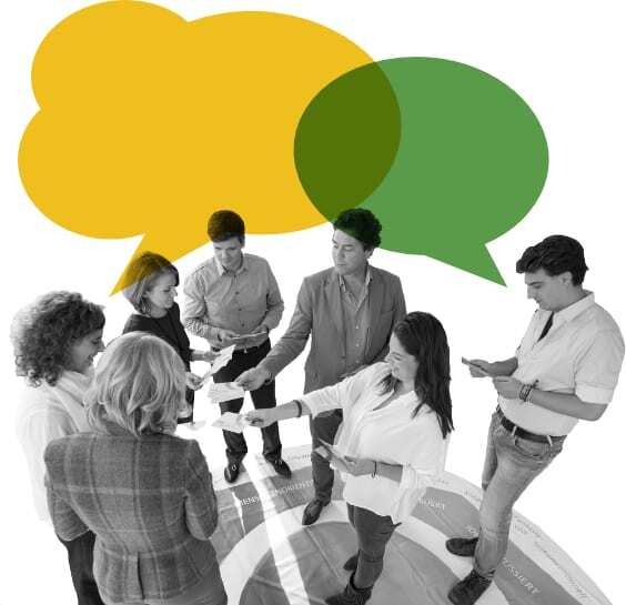 team workshop where participants are looking at Spark cards